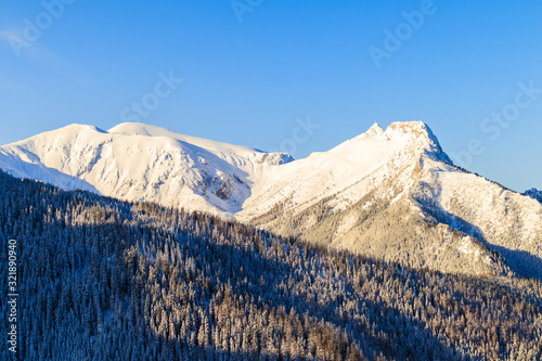 View of Giewont mountain at sunrise in winter season, Tatra Mountains, Poland