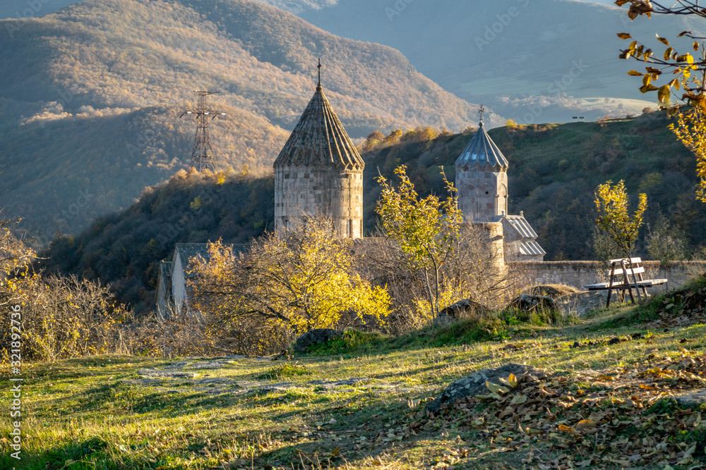 Panoramic view on 8th century ancient Tatev Monastery, located in Armenia, Syunik Province , Tatev village. Autumn landscape in caucasus mountains during sunset