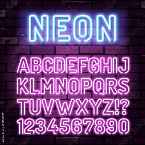 Purple Neon Alphabet on Brick Wall
