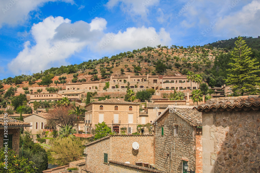 Obraz premium view over Deia town at the west coast of Mallorca, Spain