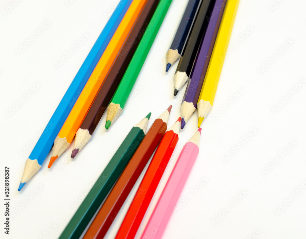 set of colored pencils on a white background set of colored pencils on a white background