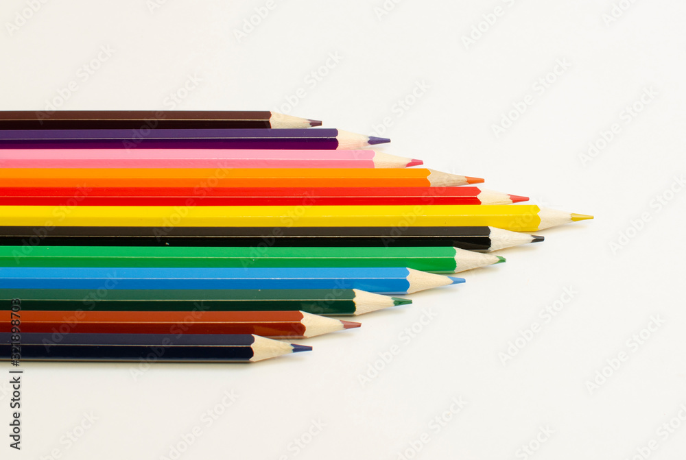 set of colored pencils on a white background	
