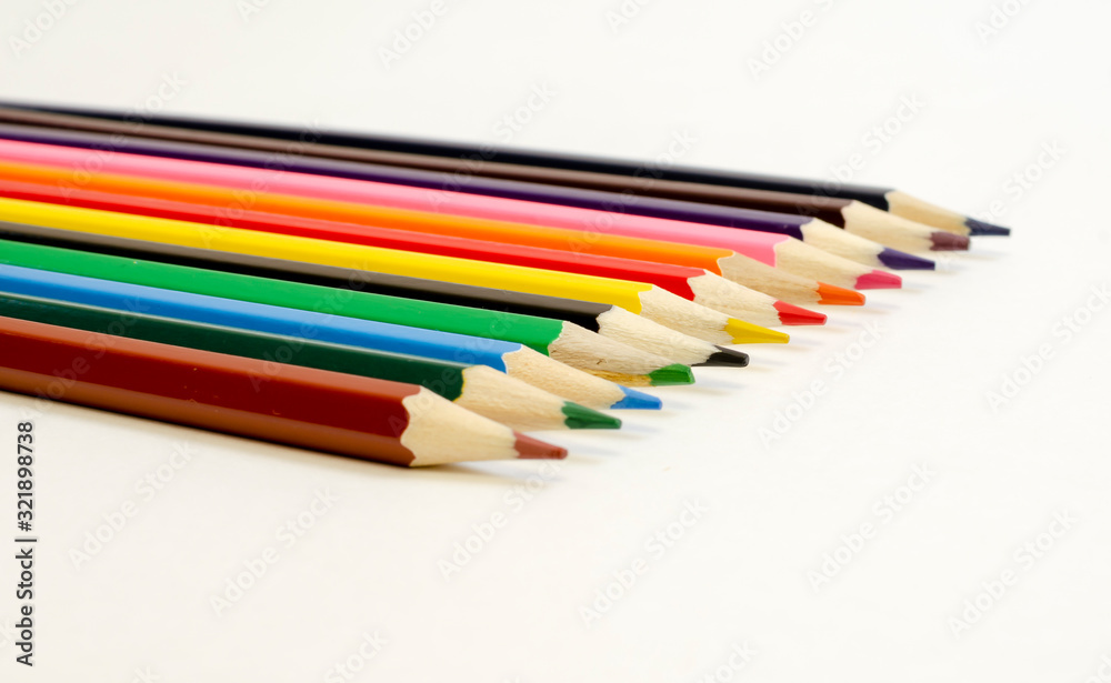 set of colored pencils on a white background set of colored pencils on a white background