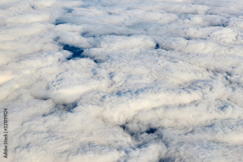 Top view on dense white clouds. © Konstiantyn Zapylaie