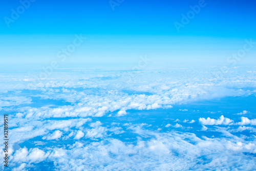 View over the clouds. Blue sky and clouds.