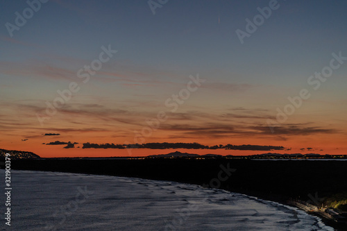 Feniglia beach in Orbetello at dusk - Italy photo