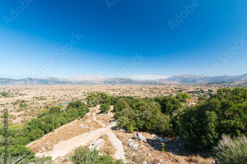 View on the towns of Plati and Magoulas on the Lasithi Plateau, Crete, Greece photo