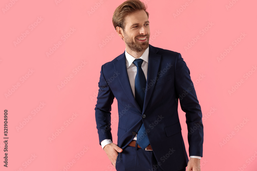 Fototapeta premium Positive businessman smiling and looking away