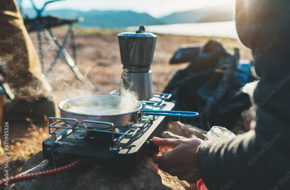 Cooking In Nature person cooking in nature camping outdoor, cooker prepare breakfast ...