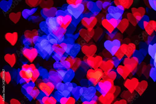 Red and blue hearts bokeh as background for Valentine's day.