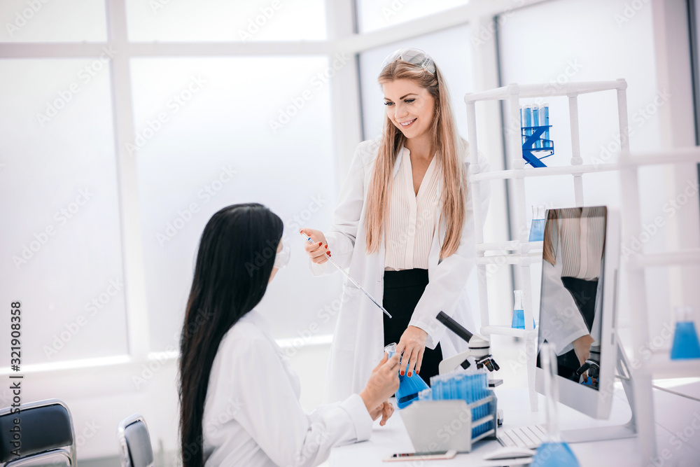 Fototapeta premium laboratory staff working with tests for coronavirus