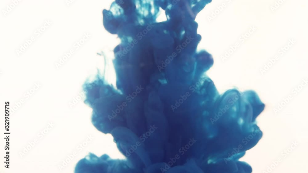 Colorful abstract art. Acrylic painting background texture in water creates an interesting abstraction on a white background. Spray of different colors. Colorful abstract art. Acrylic painting background texture in water creates an interesting abstraction on a white background. Spray of different colors.