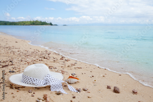 Hat on the sandy beach.