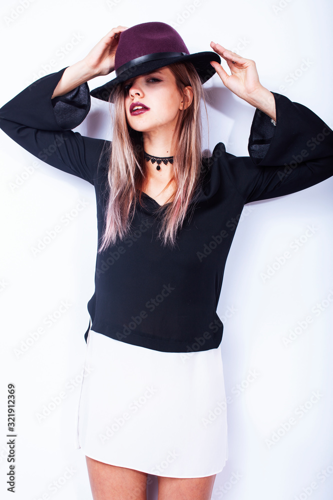 young pretty hipster girl in hat emotional posing, gesturing, fashion addict shopping people concept young pretty hipster girl in hat emotional posing, gesturing, fashion addict shopping people concept