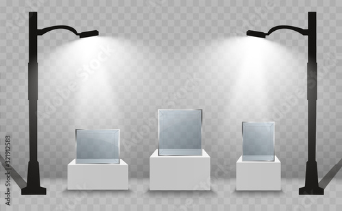 Glass showcase for the exhibition in the form of a cube. Background for sale illuminated by spotlights. Museum glass box isolated advertising or business design boutique. Exhibition hall.