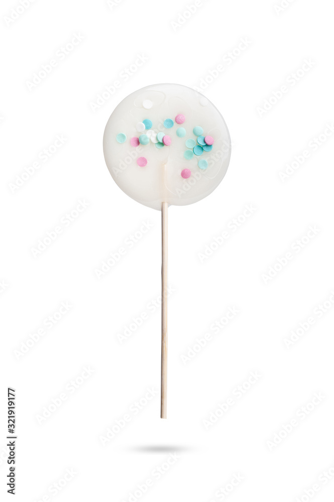 caramel cane on a wooden stick. isolated on white background caramel cane on a wooden stick. isolated on white background