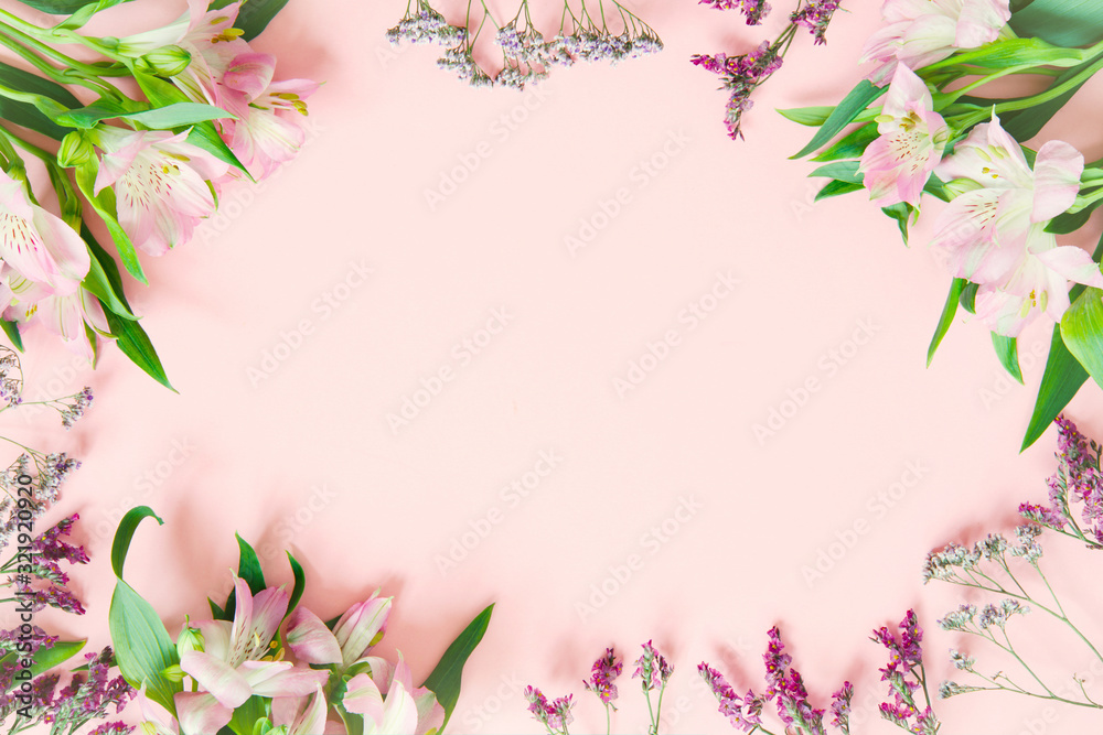 Pink background with spring flowers, festive composition for spring holidays Pink background with spring flowers, festive composition for spring holidays