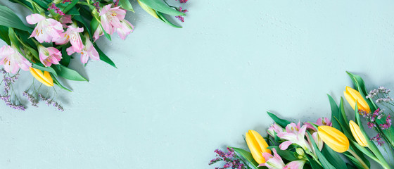 Blue banner with spring flowers, festive composition for spring holidays
