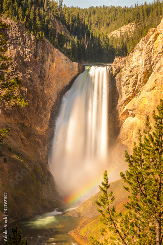 Yellowstone Falls with a rainbow in Yellowstone National Park  Wyoming  USA