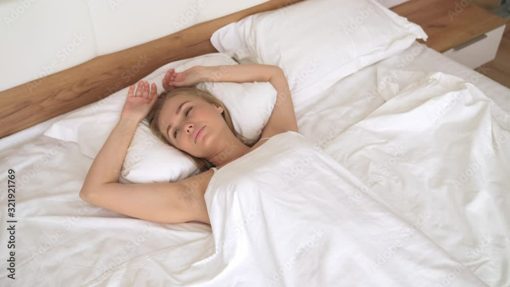 Lovely blonde waking up in morning. Lovely blonde waking up in morning.