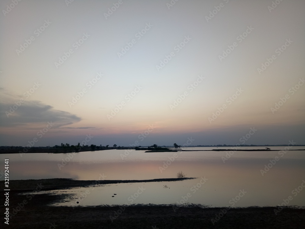 Sunset on The Huai Sawai Reservoir.