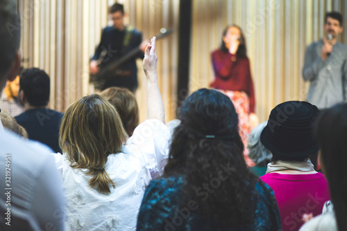Bild auf Leinwand Christian congregation worship God together