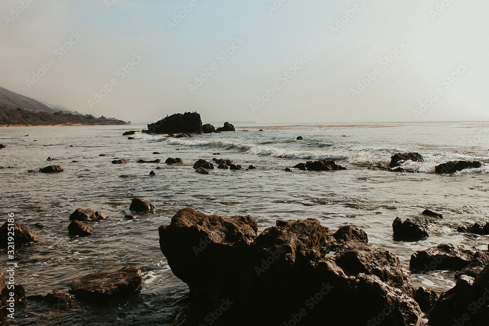 Coastline with rocks and hills