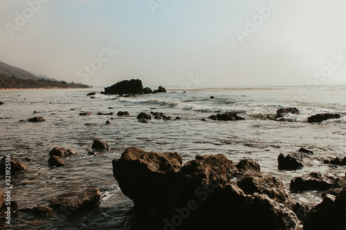 Coastline with rocks and hills
