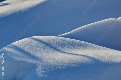 Shadow on snow in winter