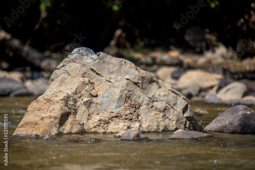 Close-up photography of river rocks captured at the Moniquira river in the department of Boyaca in the central Andean mountains of Colombia
