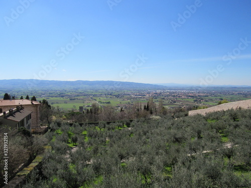 View from an overlook at hills, valleys, and towns as seen from Assisi, Italy