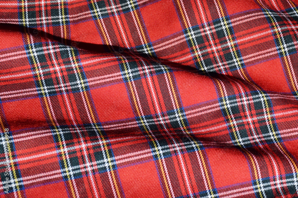 Stunning bright red tartan material Stunning bright red tartan material