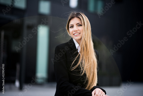 Smiling young business woman portrait © Minerva Studio