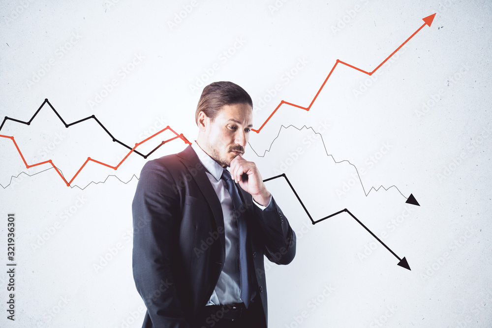Thinking businessman standing near drawing arrows. Thinking businessman standing near drawing arrows.