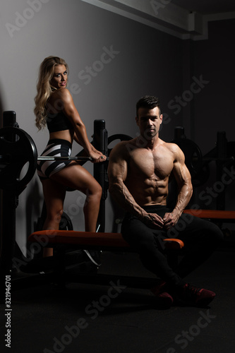 Fit Couple Together Training Chest With Weights