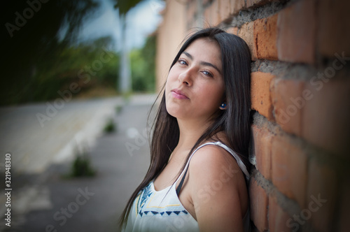 latin woman gourgeous in a wall © Yanchapaxi