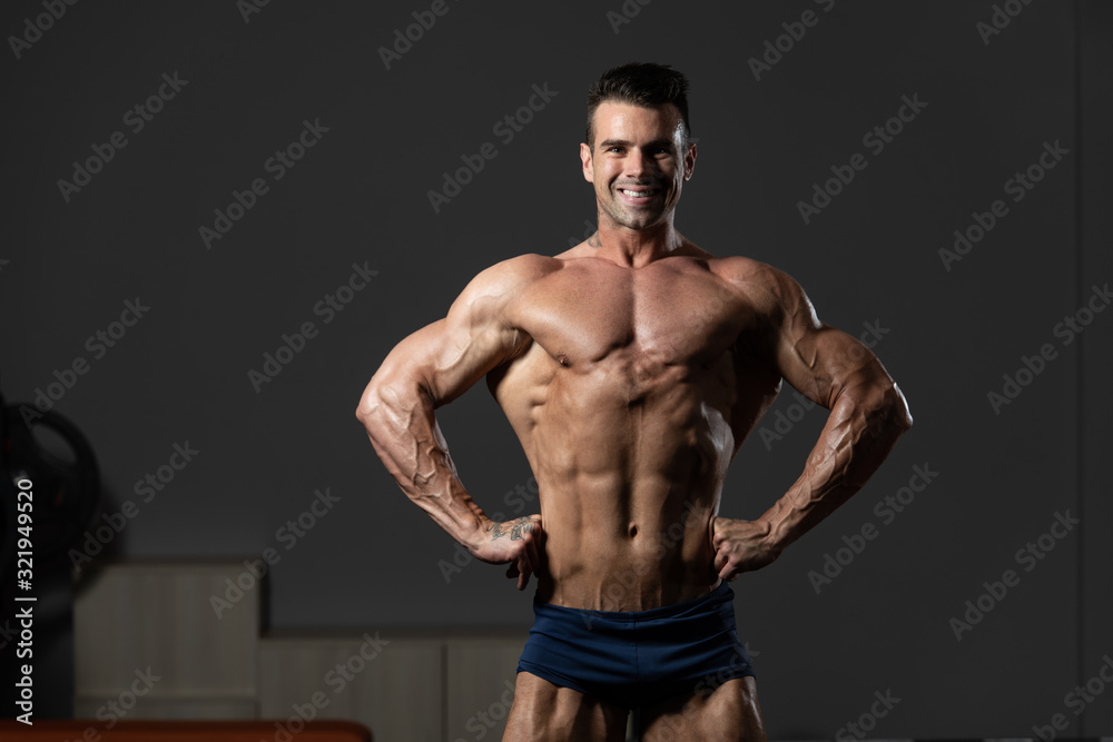 Bodybuilder Flexing Muscles