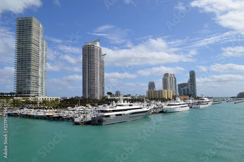 Luxury condominium towers overlooking a marina in Miami Beach,Florida © Wimbledon