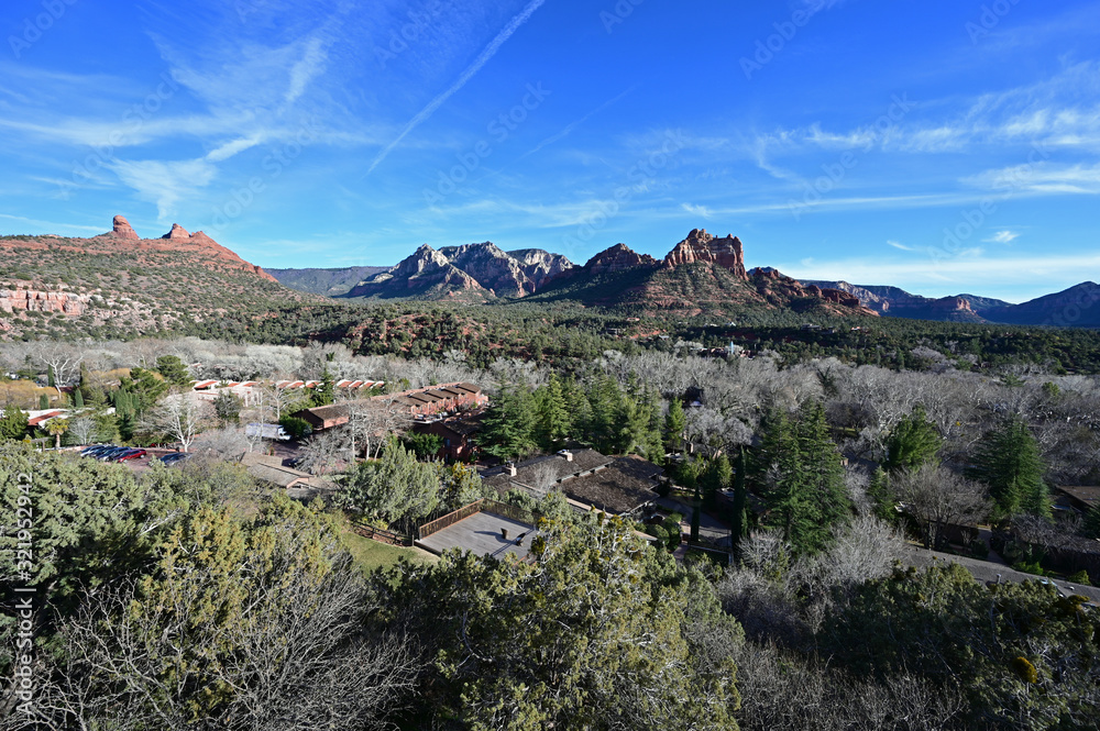 Sedona, Arizona - January 24, 2020 - East Sedona with red rock formations in background in afternoon light.