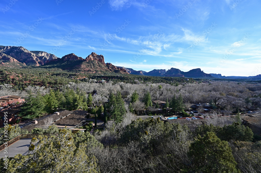 Sedona, Arizona - January 24, 2020 - East Sedona with red rock formations in background in afternoon light.