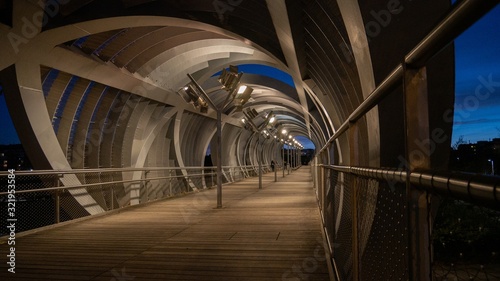 Принти на полотні Inside the spectacular Arganzuela footbridge enclosed with spiraling metal desig