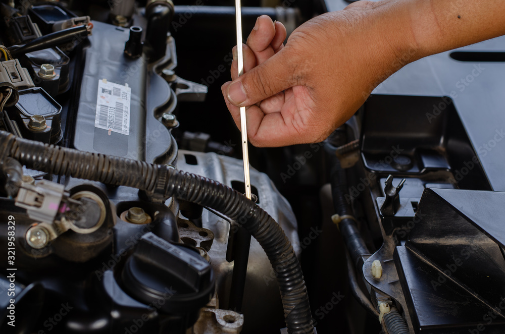 check the oil level in car engine check the oil level in car engine