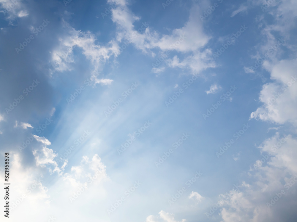 blue sky horizontal with beautiful puffy fluffy clouds with sunlight, abstract nature background