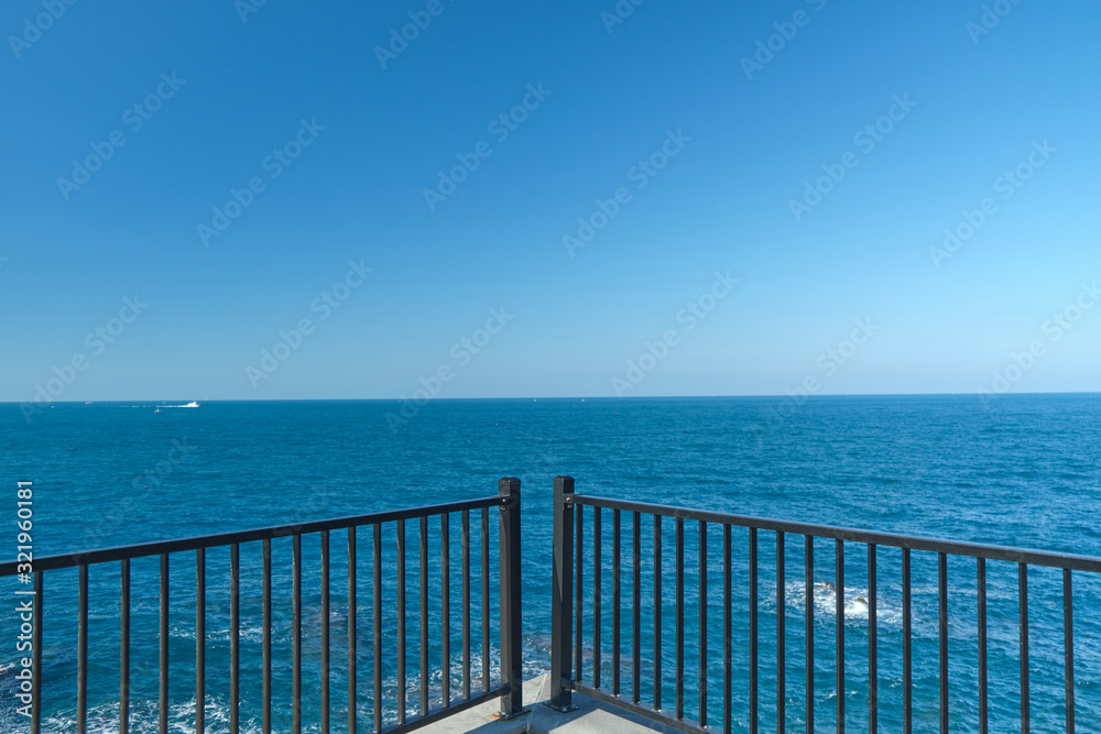 Terrace and gazebo with endless blue sea and horizon. Terrace and gazebo with endless blue sea and horizon.