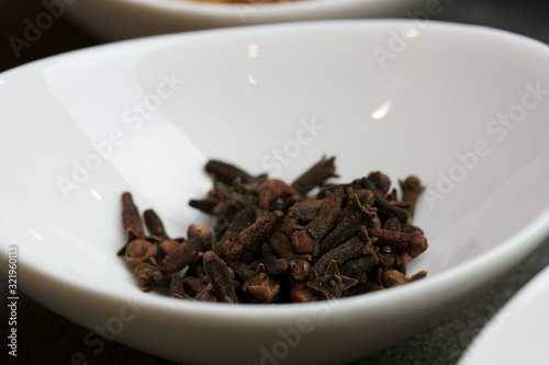 Close up of whole Cloves in a bowl