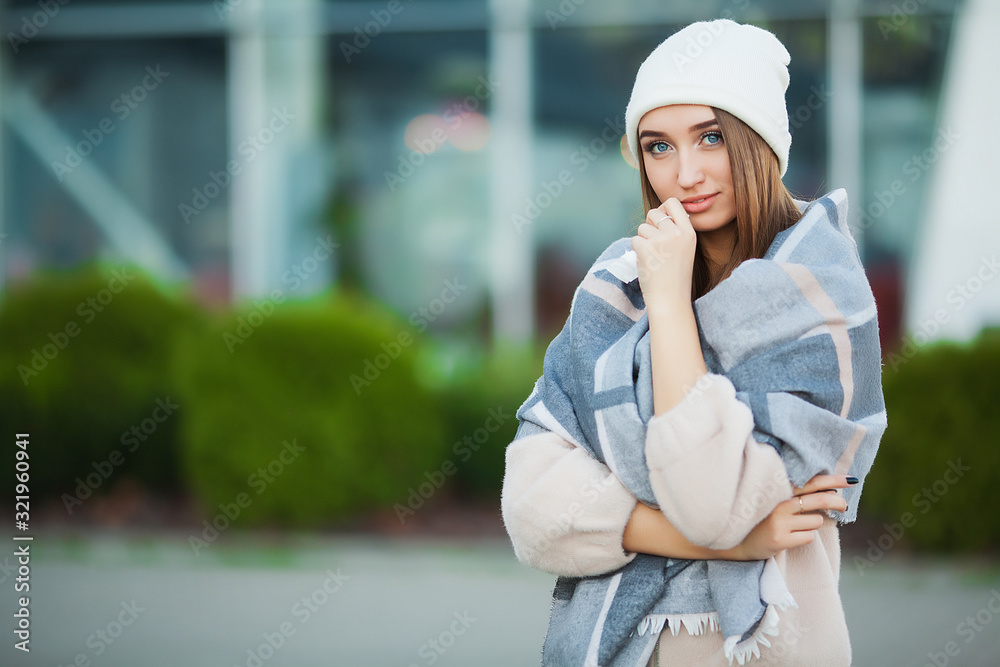 Fototapeta premium Woman with flu outdoors dressed in cap