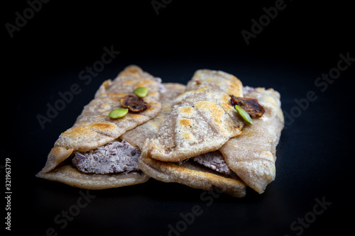 Fried Sorghum pancake with red bean which is called susu bukkumi in Korea