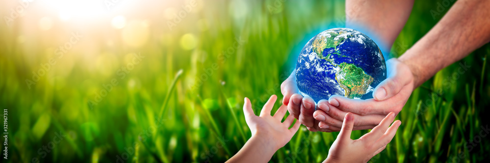 Hands Of Man Earth To Child - The Environment For Future Generations Concept - Some Elements Of This Provided By NASA Stock Photo | Adobe Stock