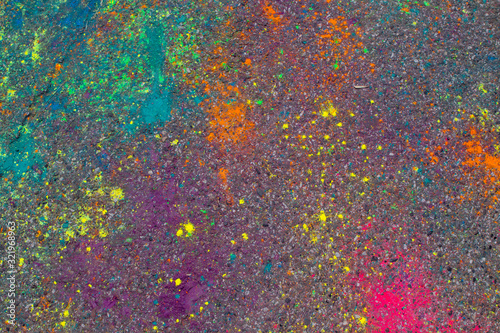 Background of colorful Holi powder on the ground