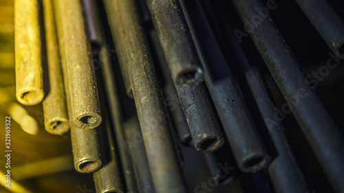metal pipes in bulk, heavy industry, steel, cast iron